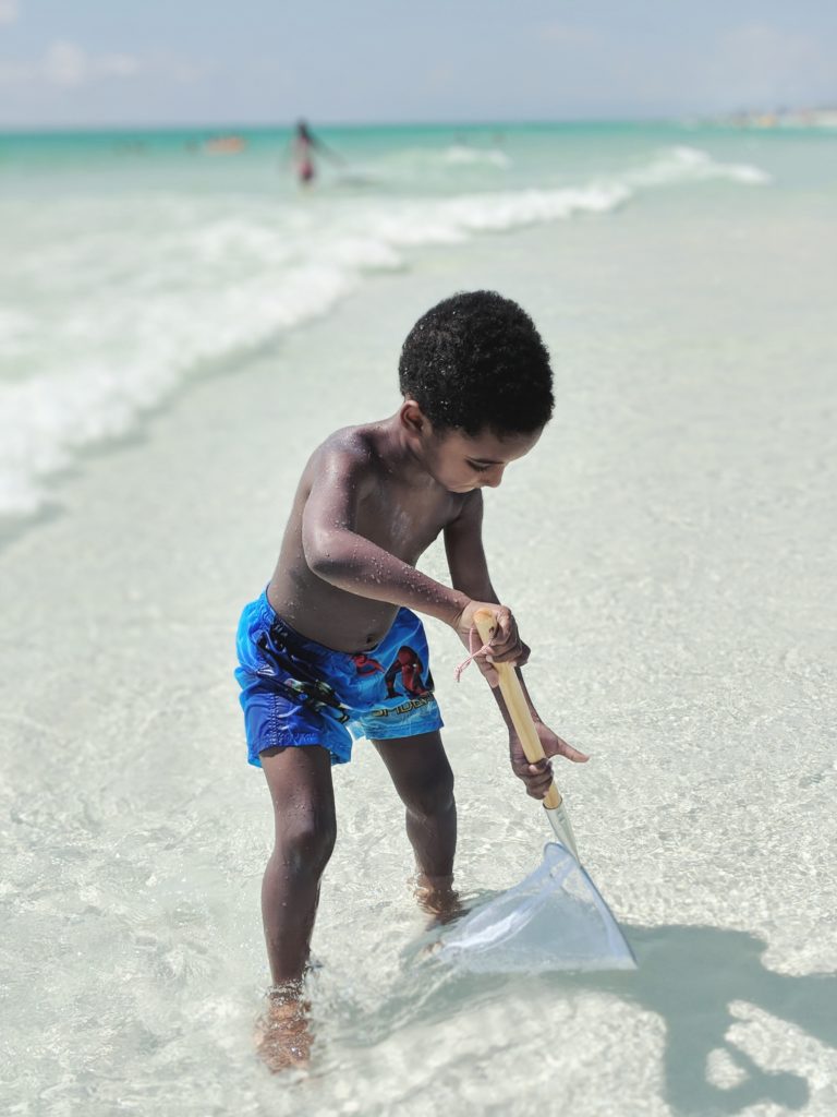 destin florida, kid playing on beach